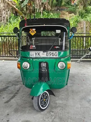 Bajaj RE 2011