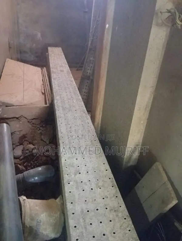 Adjustable Jacks with Scaffolding Planks