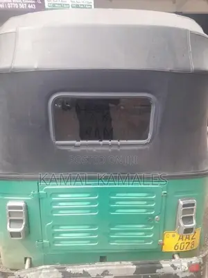 Bajaj RE 2014