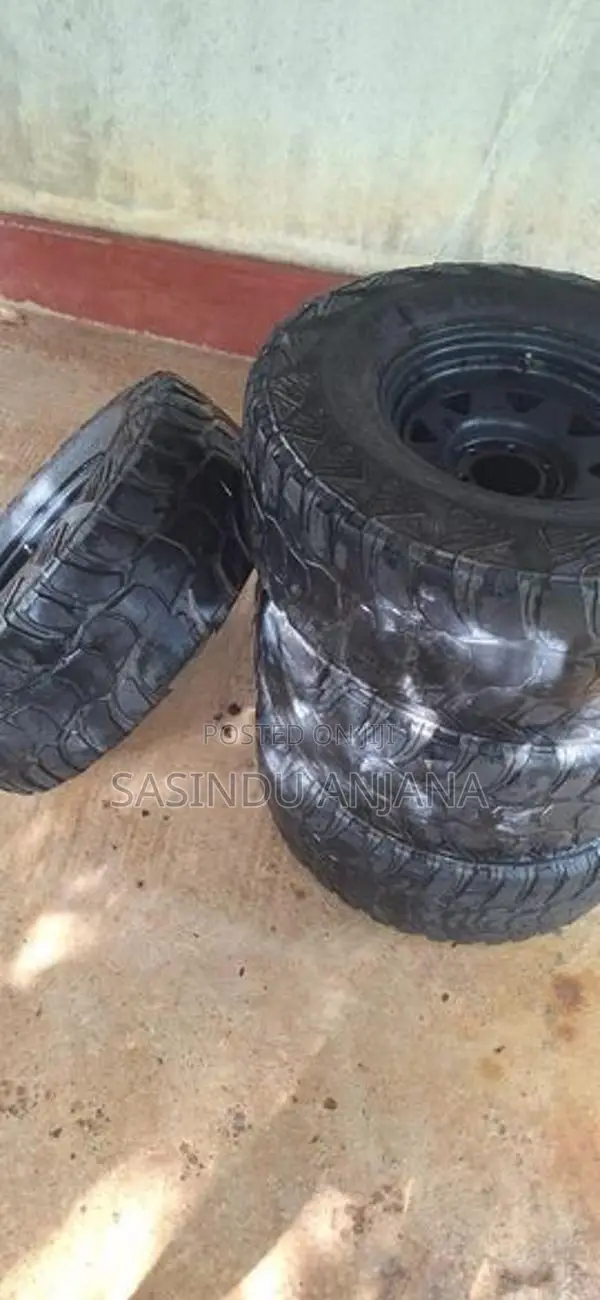 Mud Cut Tires with Rim (Rim 16 Tire 33 Size )