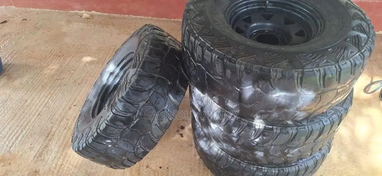 Mud Cut Tires with Rim (Rim 16 Tire 33 Size )