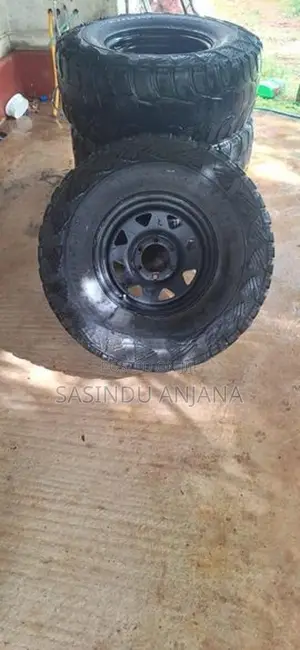 Mud Cut Tires with Rim (Rim 16 Tire 33 Size )