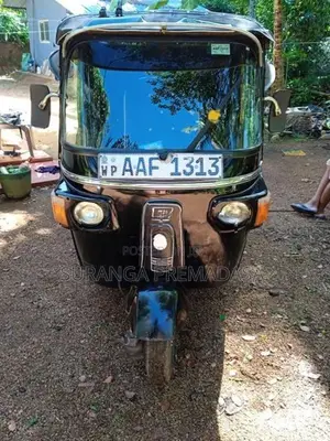 Bajaj RE 2014