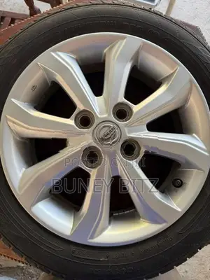 Nissan Alloy Wheels with Dunlop Tires (155/65R14)