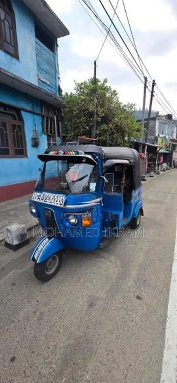 Bajaj RE 2013