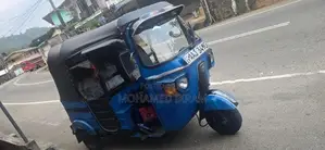 Bajaj RE 2013