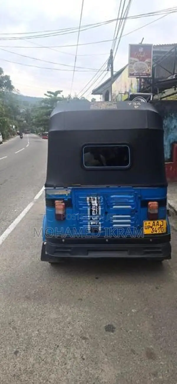 Bajaj RE 2013