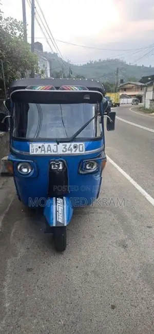 Bajaj RE 2013