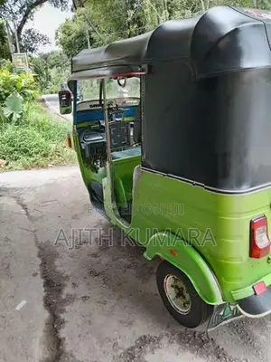 Bajaj RE 2011