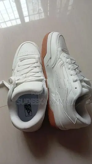 Classic White Vans Sneakers