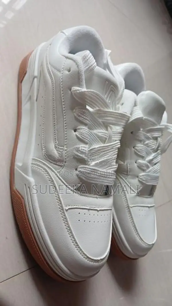 Classic White Vans Sneakers