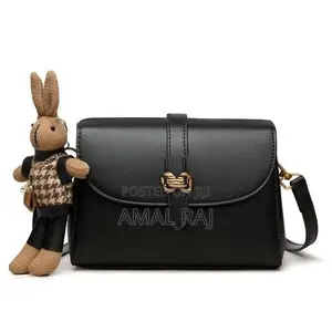 Stylish Black Leather Crossbody Bag with Cute Bunny Charm
