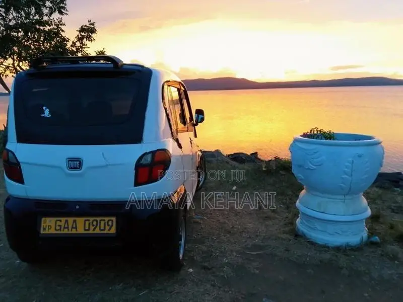 Bajaj Qute White 2019