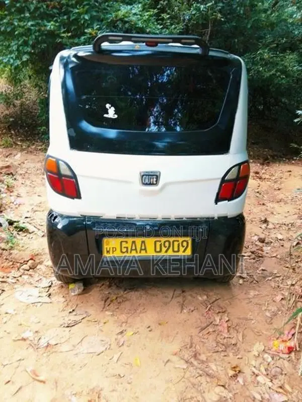 Bajaj Qute White 2019