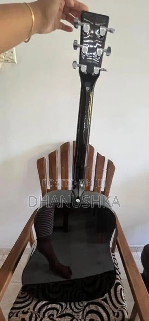 Left Handed Acoustic Guitar