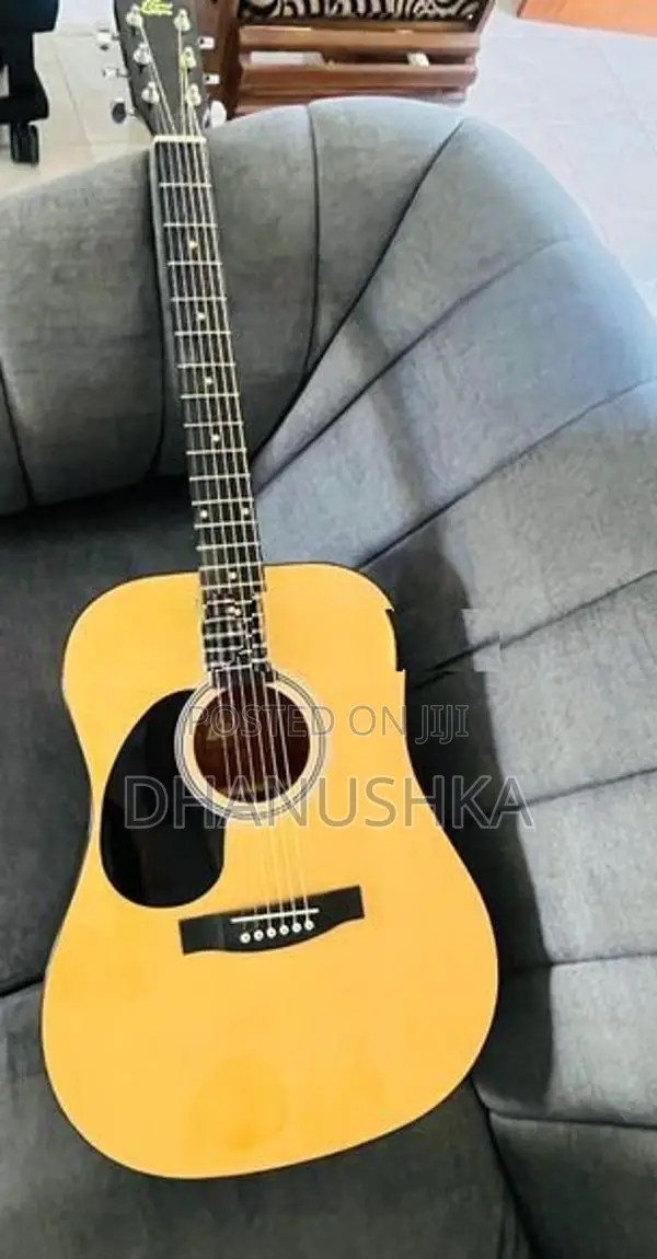 Left Handed Acoustic Guitar