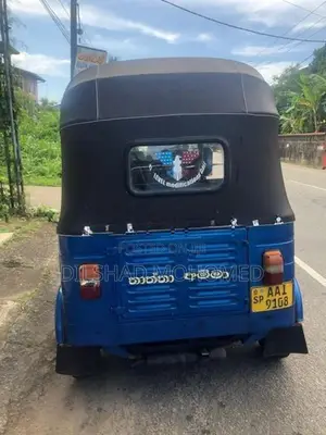 Bajaj RE 2013