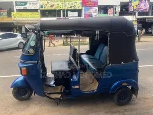Bajaj RE 2013
