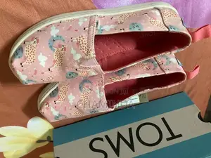 Tom’s Brand New Shoe Pair