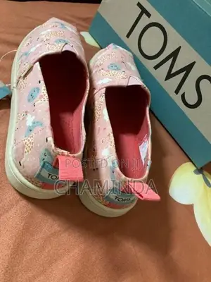 Tom’s Brand New Shoe Pair