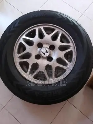 4 Tires And wheels 185 / 70
