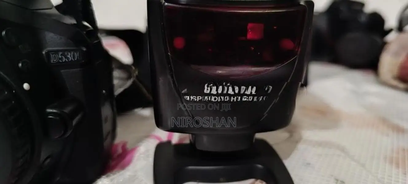 Nikon D5300 Camera with Lens, Speed Light