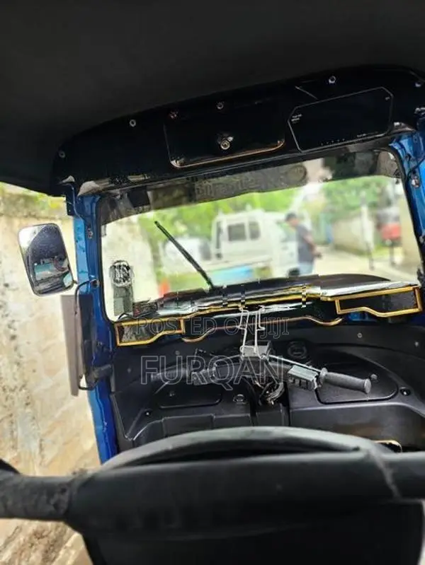 Bajaj RE 2016