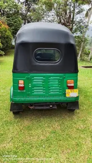Bajaj RE 2011