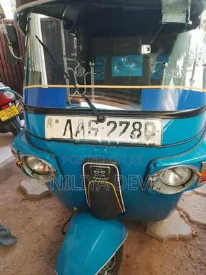 Bajaj RE 2013