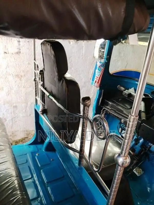 Bajaj RE 2013