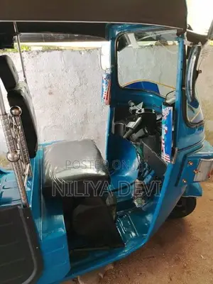 Bajaj RE 2013