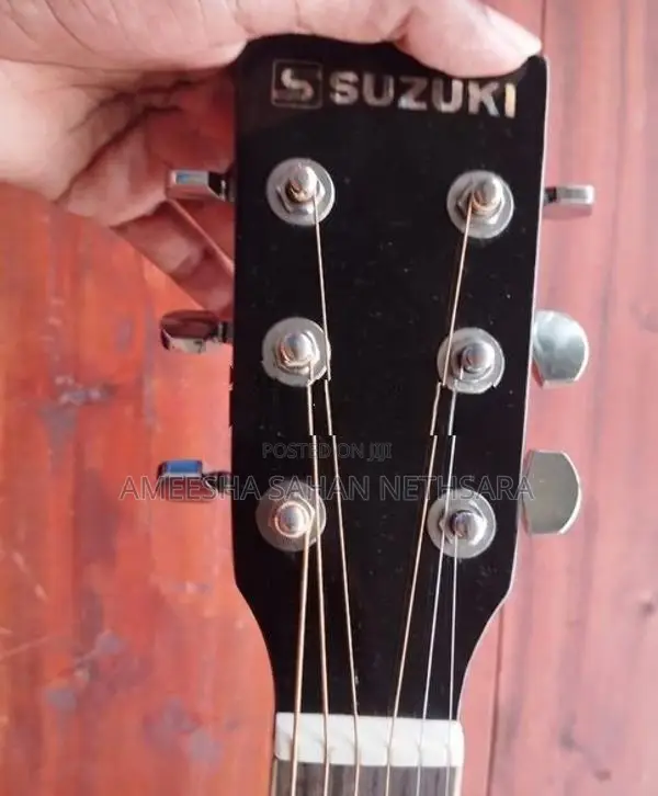 Suzuki Guitar with Amplifier