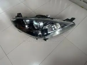 Mazda Demio Cenon Head Lamp