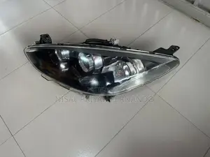 Mazda Demio Cenon Head Lamp