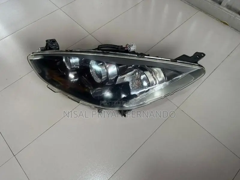 Mazda Demio Cenon Head Lamp