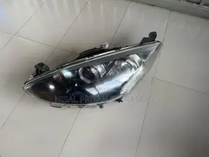 Mazda Demio Cenon Head Lamp