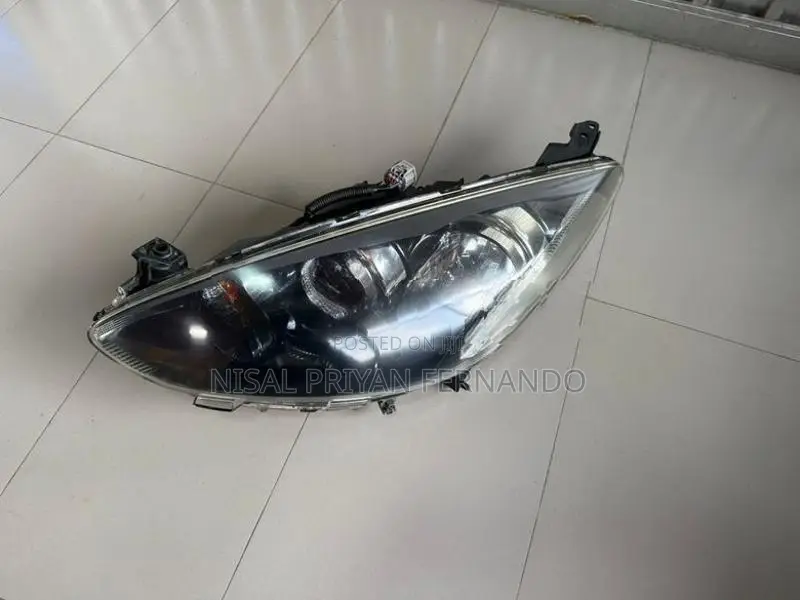 Mazda Demio Cenon Head Lamp