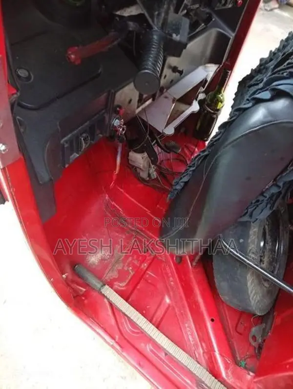 Bajaj RE 2013