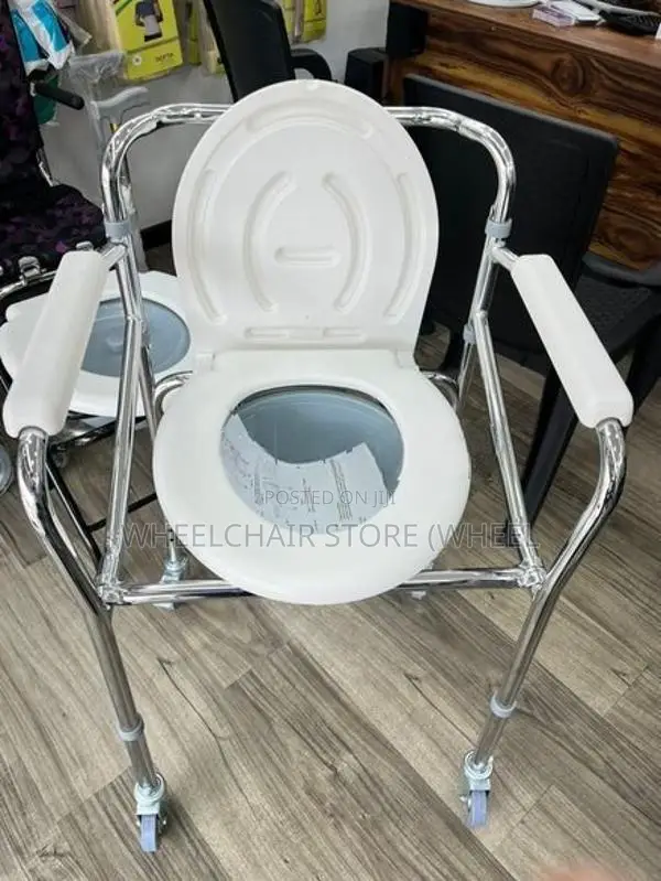 Commode chair with wheel