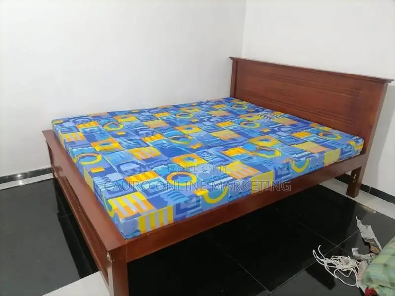 new teak box bed with double layer mattress