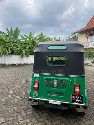 Bajaj RE 205 2025