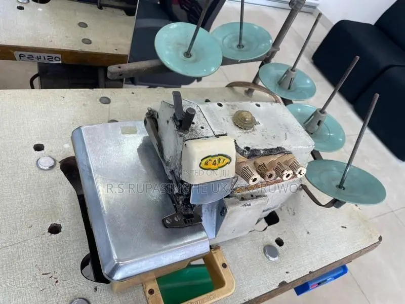 5 three overlock machine siruba