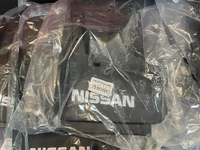 Nissan Caravan E24 OEM Mud Flaps