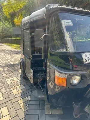 Bajaj RE 2011