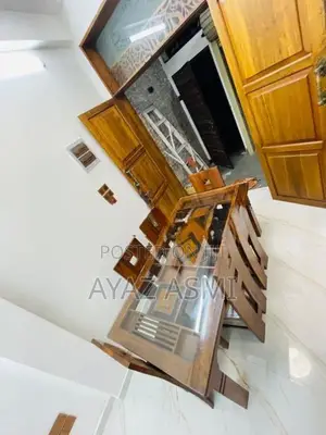 Teak dining table