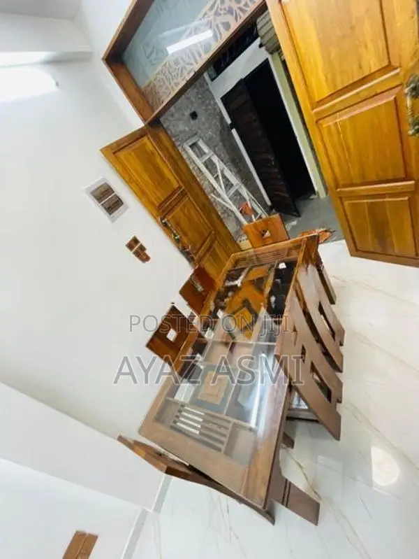 Teak dining table