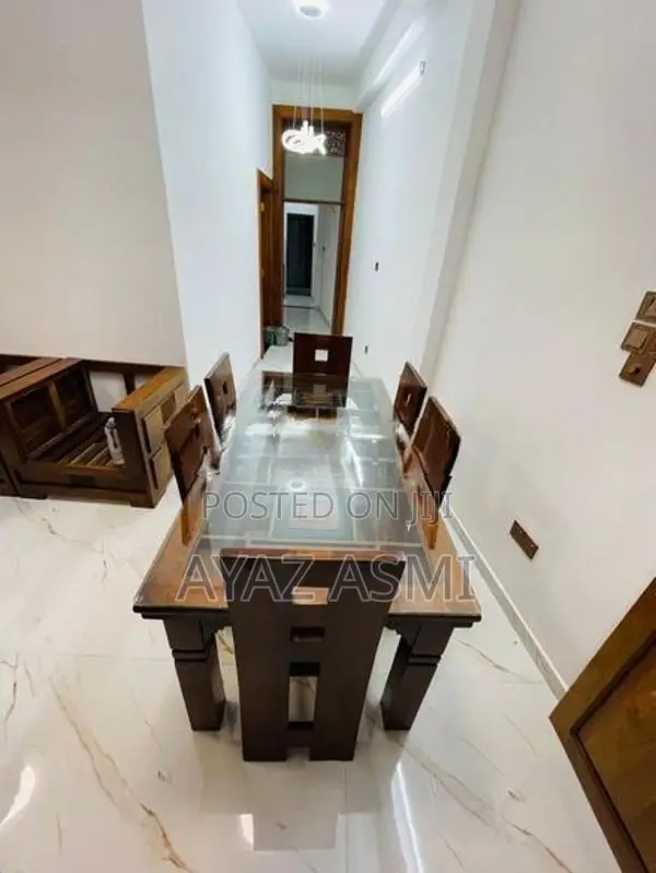Teak dining table