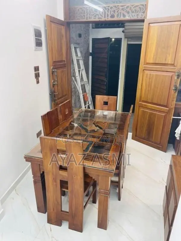 Teak dining table