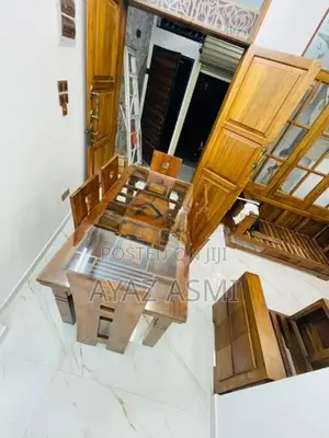 Teak dining table