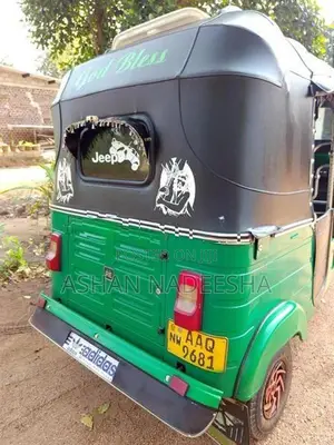 Bajaj RE 2014